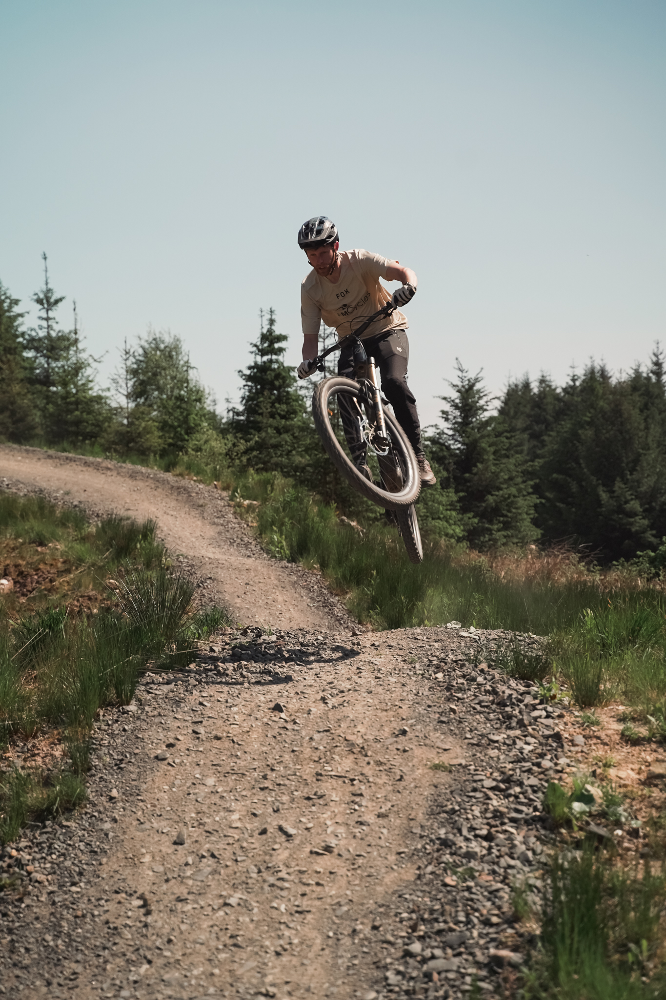 Rider hitting jumps on the Kielder trails