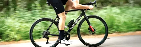 Cyclist riding a Colnago Road Bike