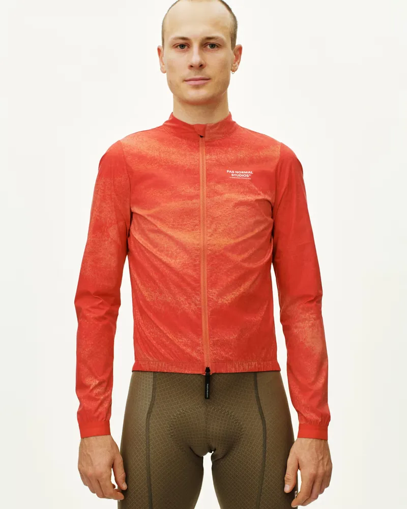 Pas Normal Studios Mechanism Stow Away Jacket in AOP Hibiscus Orange-2