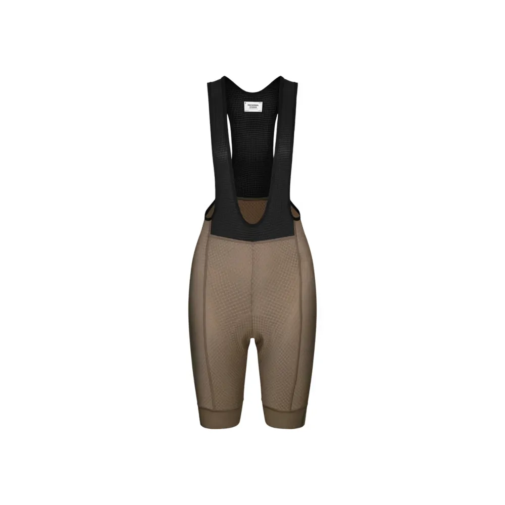 Team Cycles Pas Normal Studios Women's Essential Bibs in Earth | Interest FREE Finance & Online Refund Policy.