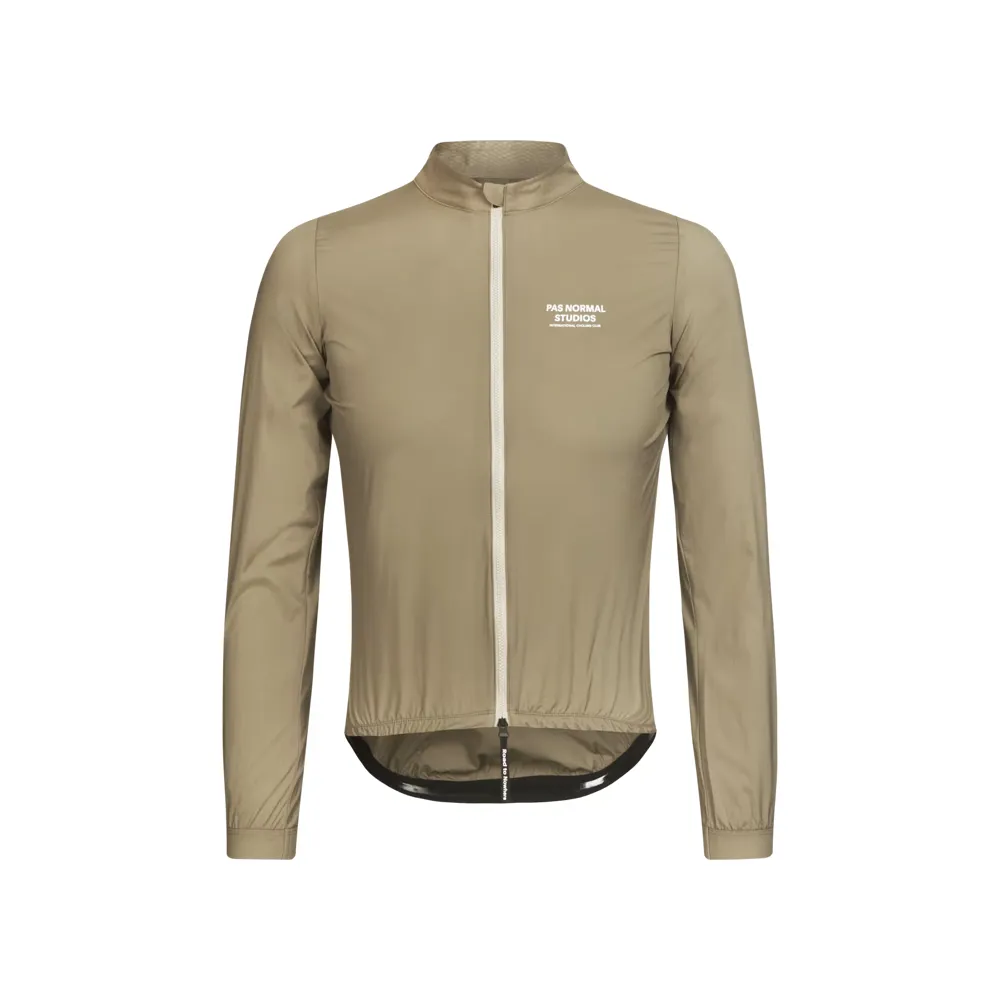 Team Cycles Pas Normal Studios Mechanism Stow Away Jacket in Beige | Interest FREE Finance & Online Refund Policy.