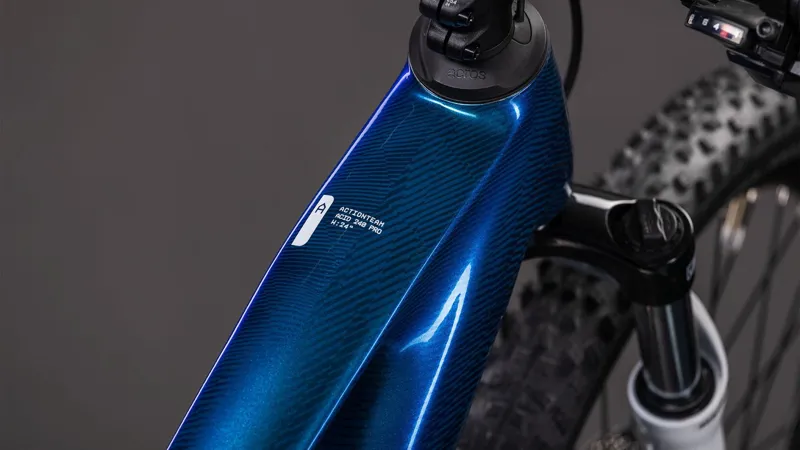 Cube Acid 240 Hybrid Rookie Pro 400Wh Kids Electric Mountain Bike in Actionteam-2