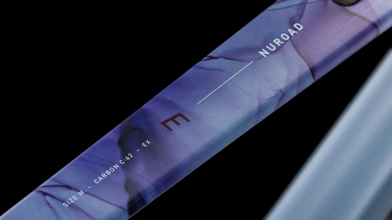 Cube Nuroad C:62 EX Gravel Bike in Pigeonblue and Art-1