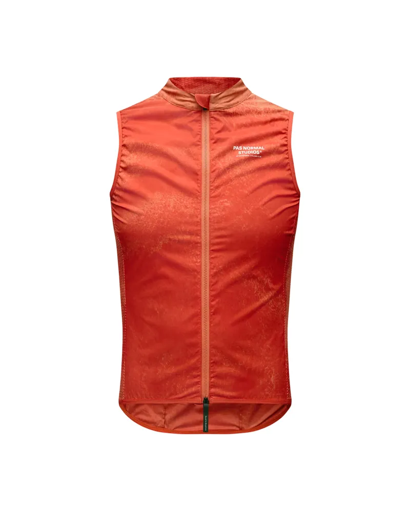 Pas Normal Studios Mechanism Stow Away Gilet in AOP Hibiscus Orange