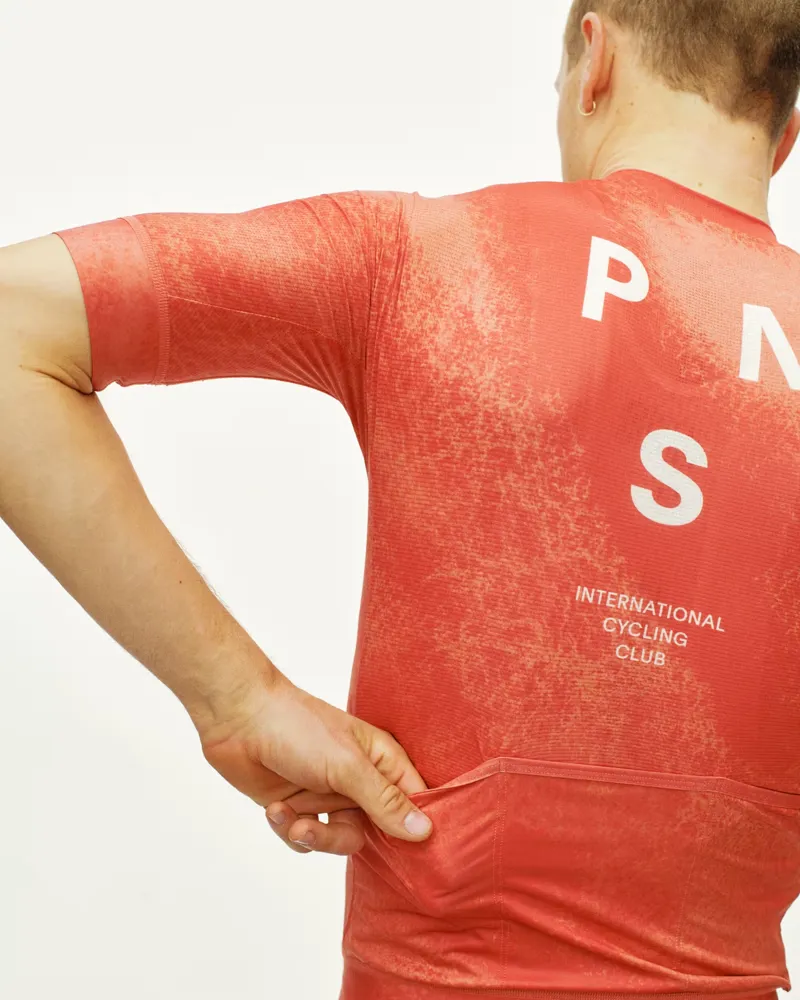 Pas Normal Studios Mechanism Jersey in AOP Hibiscus Orange-5
