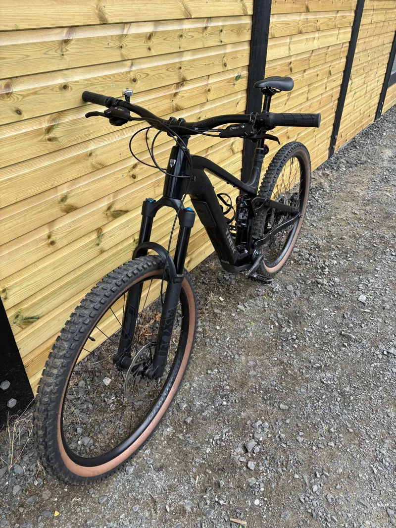 Ex Hire TREK Fuel+ EX 8 580Wh Electric Full Suspension Mountain Bike in Trek Black and Purple Flip Splatter-1