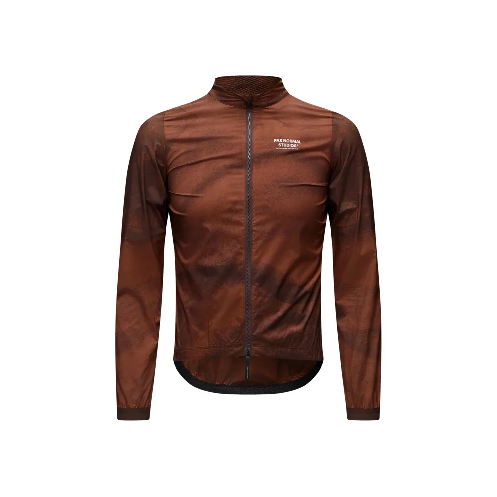 Team Cycles Pas Normal Studios Mechanism Stow Away Jacket in AOP Light Brown | Interest FREE Finance & Online Refund Policy.