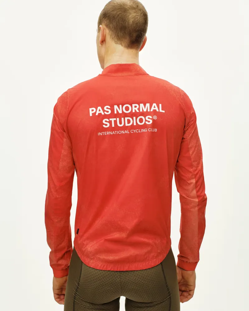 Pas Normal Studios Mechanism Stow Away Jacket in AOP Hibiscus Orange-3