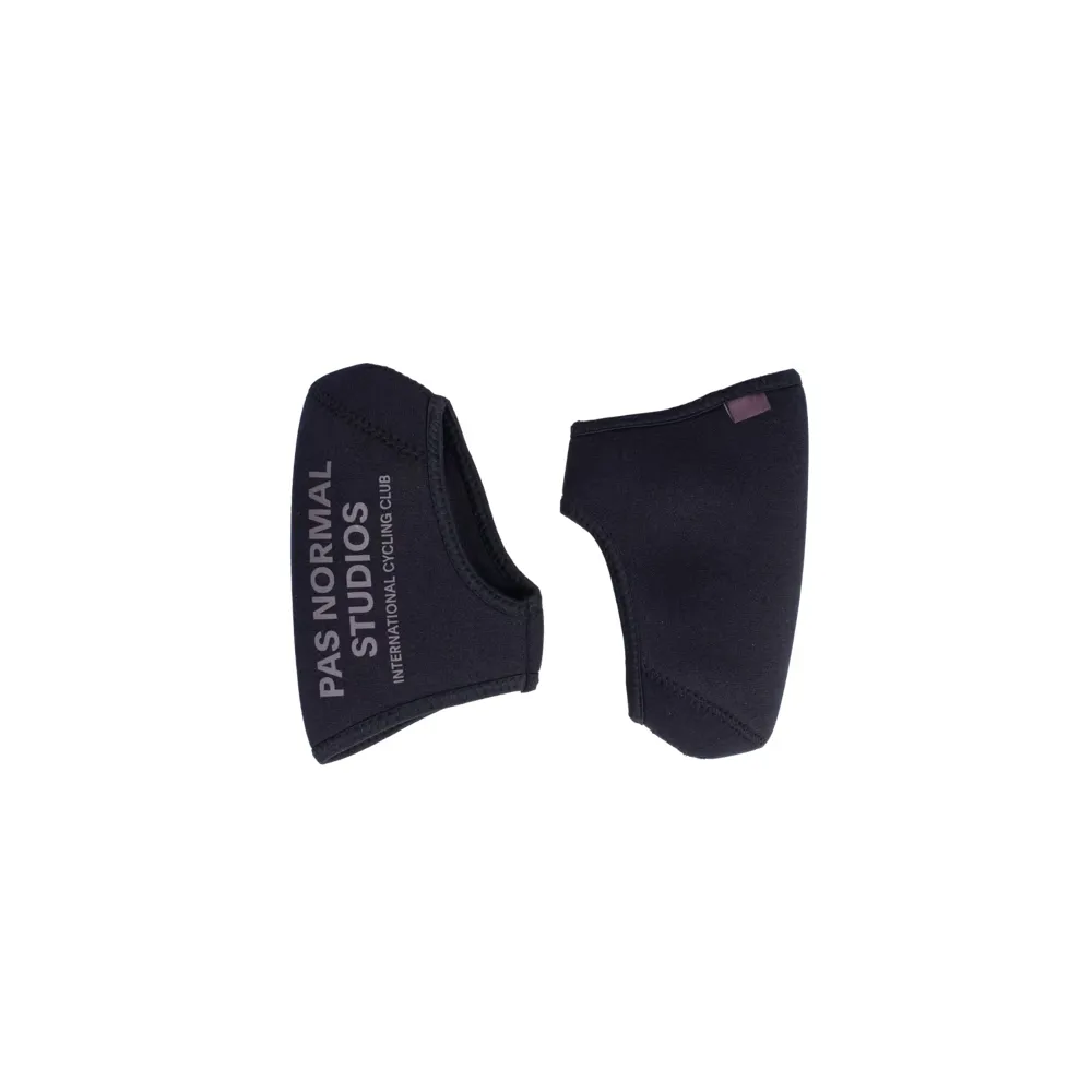 Team Cycles Pas Normal Studios Logo Toe Cover in Black | Interest FREE Finance & Online Refund Policy.