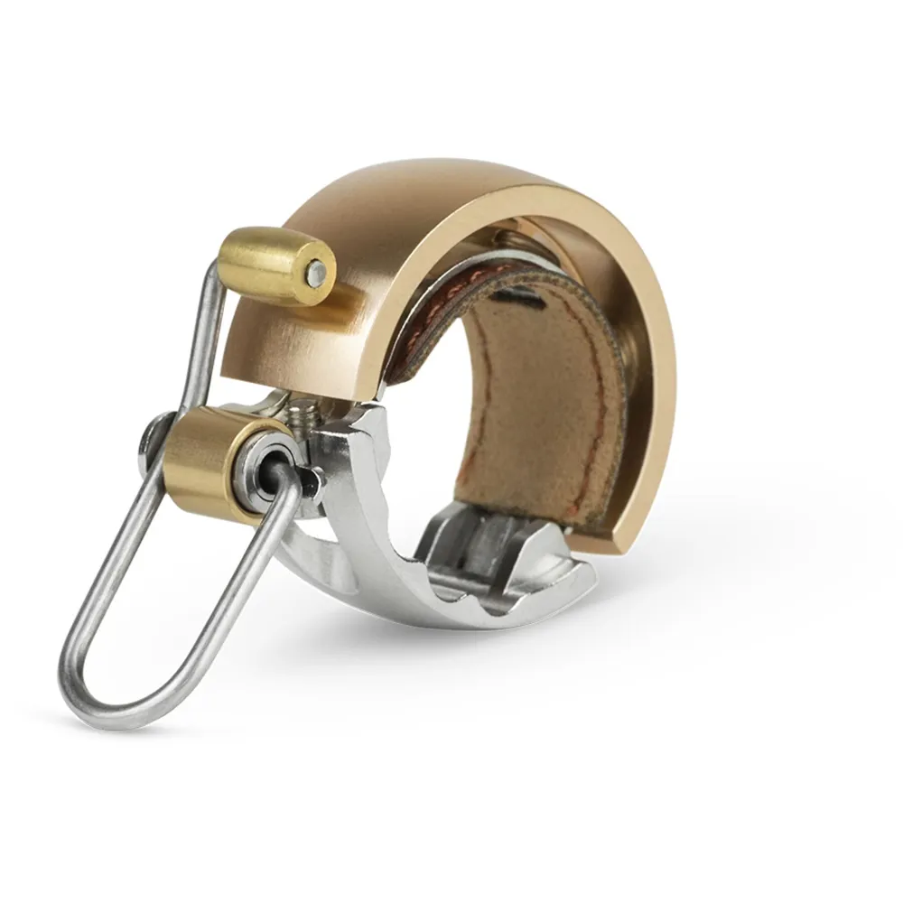 Team Cycles Knog Oi Luxe Small Bicycle Bell in Brass | Interest FREE Finance & Online Refund Policy.